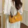 Versátil textura tejida nueva 2026 para mujer, exquisita bolsa diagonal retro para debajo del brazo, bolso de mano texturizado, bolso de hombro único para el commuting de otoño