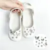 Correa de abanico versátil para chicas, dijes de zapatilla de ballet de mariposa, hebillas para zuecos, accesorios florales de alta gama, decoración de zapatos para manualidades al por mayor