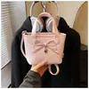 Bolsa de Mão Fresca e Simples Estilo Coreano para Meninos e Meninas, Bolsa Transversal Elegante e Minimalista com Laço, Nova Bolsa de Balde Infantil Transfronteiriça