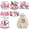 Pegatinas de transferencia de calor con patrón de dibujos animados rosas temáticas navideñas, adecuadas para ropa transfronteriza, camisetas, impresión de logotipos, impresión offset con tinta blanca y venta al por mayor