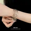 Pulsera Ancha Redonda Hueca de Metal de Venta Caliente Europea y Americana Brazalete Exagerado Único Sentido de Diseño de Moda Joyería de Mano de Nicho para Mujeres