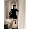 Vestido Preto de Alta Qualidade Estilo Princesa Transfronteiriço com Saia Bufante, Combinado com um Casaco Estilo Francês e um Vestido de Tricô Preto com Gola Semi-Alta