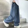 Roupas infantis calças jeans para meninos 2026 novo estilo calças infantis versão coreana calças compridas estilosas moda calças largas da moda tendência