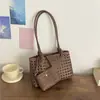 Bolsa Tote Tecida de Grande Capacidade Transfronteiriça 2026 Nova Bolsa de Ombro Coreana Vazada Textura de Alto Padrão Bolsa para o Dia a Dia Mãe-Filho