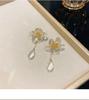 Pendientes de plata S925 con diseño de flor transparente y súper hada, elegantes pendientes de estilo Mori de alta gama para mujer, joyería para las orejas con estilo Ins que combina con todo.