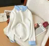 Otoño/Invierno 2026 Nuevo Estilo Más Vendido Diseño Original de Alta Calidad Tejido Falso de Dos Piezas Suéter con Cuello de Solapa Suave y Acogedor Top para Mujer