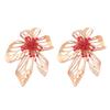 Nueva tendencia de moda de otoño, pendientes de aleación hueca con núcleo de flor acrílica, pendientes europeos y americanos, pendientes elegantes retro para mujer