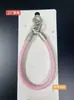 Nova pulseira de couro triangular com fivela dupla para celular, acessório universal, pulseira simples com fivela dupla, corrente de suspensão anti-queda