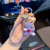 Chaveiro de urso em formato de coração todo cravejado com strass e pulseira de pulso com strass, pingente de figura de urso de desenho animado, chaveiro de carro