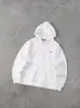 Sudadera con capucha y cremallera de alta gama para hombre y mujer, casual para exteriores, transfronteriza, estilo europeo y americano, con bloques de color y bordado de pececitos