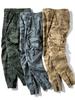 Calças Casuais Masculinas para Primavera e Outono de 2026 Calças Longas com Múltiplos Bolsos Camufladas Verde Militar Calças de Trabalho Calças Estilo Coreano para Jovens Estudantes
