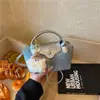Bolsa de teléfono retro de alta gama para mujer, nueva y moderna bolsa de hombro cruzada de moda 2026, bolso de mano versátil para el día a día