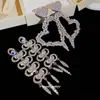 Pendientes de Corazón Geométrico Hueco Estilo Corte Europeo y Americano con Diamantes, Pendientes de Lujo Ligero de Gama Alta, Accesorios de Oreja Exagerados