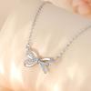 Collar de plata de ley 925 con lazo dulce, joyería para mujer, cadena de clavícula con diseño de nicho ligero y exquisito de alta calidad.