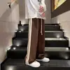 Pantalones largos de rayas de otoño nuevos transfronterizos de alta calle, pantalones de pierna ancha rectos holgados de moda, pantalones casuales deportivos a la moda