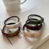 Cuerda para el Cabello Curva de Color Sólido Geométrico Etiqueta Dorada Anillo para el Cabello Elegante de Gama Alta Accesorios para el Cabello de Resina Banda Elástica Alta Banda de Goma Básica Sombrerería