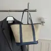 Bolso casual de moda personalizado de gran capacidad para mujer, nuevo bolso de hombro de verano 2026, bolso tote de diseño de nicho moderno