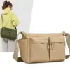 Bolso bandolera de gran capacidad para otoño e invierno para mujer, nuevo modelo 2026, mochila de viaje unisex, bolso de tela de color liso ligero casual
