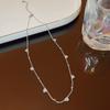 Collar de acero y titanio con diseño de nicho de alta calidad para mujer, cadena de clavícula con copos de nieve, estrella de amor, estilo simple y elegante, ligero y lujoso