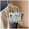 Bolso de Mano de Moda Simple y de Nicho para Mujer Verano 2026 Nuevo Bolso de Hombro de Gran Capacidad para el Trabajo con Hebilla de Cinturón Bolso Cruzado