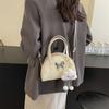 Bolso de mujer estilo coreano con diseño de mariposa, nuevo bolso de mano de moda 2024, bolso informal sencillo tipo bandolera con forma de concha