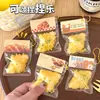Juguete de apretar creativo para aliviar el estrés, amuleto de pan con forma de tostada, accesorio versátil y divertido para mochilas y llaveros