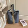 Bolso de lona simple y elegante con tres rayas, nuevo de invierno 2026, versátil, casual, de estudiante, cruzado al hombro