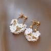 Pendientes de borlas con diseño de flor de hada y aguja plateada, ligeros, lujosos, de alta gama, estilo retro francés, elegantes, de celebridades de Internet para mujer.
