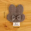 En Stock Atmósfera Otoño e Invierno Color Té con Leche Conejo Oso Mariposa Pendientes DIY Accesorios para el Cabello Accesorios Materiales