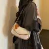 Nova bolsa tiracolo da moda de luxo leve para o início do outono de 2026, bolsa de ombro e sob o braço nova e de nicho para mulheres