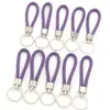 Colgante Tejido de PU Cuerda de Cuero Aleación de Zinc Multicolor Llavero Creativo Bolsas DIY Muñeca de Regalo Pequeña Colgante Antirrobo