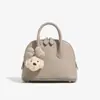 Bolso Mini Concha de Cuero Genuino Xiaozhong para Mujer, Bolso de Bolos Portátil de Alta Gama, Nuevo Bolso Cruzado al Hombro Versátil 2025