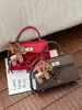 Yueziz Transfronteiriça 2026 Nova Bolsa Feminina Bolsa Kelly de Alta Qualidade Bolsa de Mão Moderna Bolsa de Ombro para Deslocamento Bolsa Transversal Pequena Quadrada