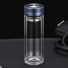 Fabricante Linyi: Vaso de vidrio de doble capa de borosilicato de alta calidad con logotipo impreso, vaso de agua resistente a altas temperaturas, vaso de té con publicidad impresa.
