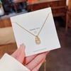 Collar de acero de titanio para mujer, cadena de clavícula con forma de calabaza de la suerte dorada colorida, colgante inteligente con forma de corazón que late, estilo simple y elegante.