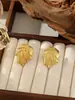 Pendientes Asimétricos de Remolino de Moda Retro de Gama Alta Europeos y Americanos Pendientes de Diseño Retorcido Personalizados Joyería para Mujeres