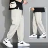 Calça esportiva casual estilosa de seda gelada de perna reta solta de perna larga cropped da moda para o verão, transfronteiriça masculina