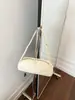 Bolsa de Ombro Transfronteiriça Design Retrô Feminina Novo Estilo Francês Nicho Bolsa Baguete Alto Valor Ins Bolsa de Ombro Único de Mão