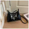 Bolso de hombro de alta gama transfronterizo para mujer, nuevo bolso casual de moda tipo bola de masa para debajo del brazo, bolso cruzado versátil de nicho para el día a día