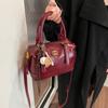 Bolsas de mão texturizadas de cor pura para mulheres 2025 outono e inverno novo estilo estilo estrangeiro bolsa de ombro da moda estilo estrangeiro roupas de trabalho crossbody