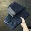Jeans Bordados para Hombre de Primavera y Otoño 2026 Nueva Marca de Moda Pierna Recta Ajustada Pantalones Largos Otoño Elásticos Casuales En Stock
