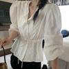 Camisa de encaje con cordón ajustable de alta gama para mujer de Dongdaemun, Corea del Sur, con cintura pequeña y fresca, para adelgazar.
