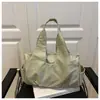 Bolsa plissada da moda para mulheres, novo estilo 2026, bolsa de ombro versátil para o dia a dia, grande capacidade, bolsa tote casual moderna, transfronteiriça
