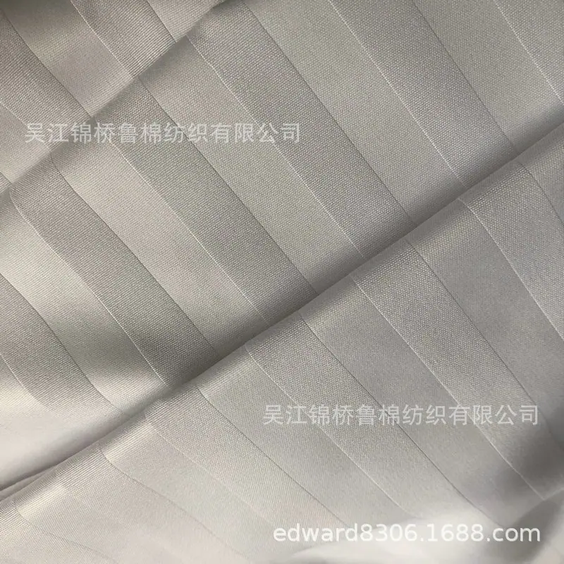 磨毛布桃皮绒压花缎条子布.jpg
