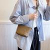Bolsa Saco de Design de Nicho Transfronteiriço com Textura de Pedrinhas para Mulheres 2025 Nova Tendência da Moda Bolsa de Ombro Único Transversal de Cor Sólida