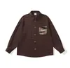 Yidao Vintage Otoño 2026 Nuevas Llegadas Retro Japonés Diseño de Textura de Raya Bolsillo Holgado Versátil Camisa Hombre