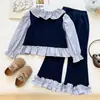 Conjunto de dos piezas para niña con patchwork, nueva colección otoño 2026, moderno diseño a rayas de bloques de color con pantalones ligeramente acampanados