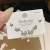 Aguja de Plata S925 Un Tarjeta Tres Pares Pendientes Sencillos Set de Lazo para Mujer Pendientes Pequeños y Exquisitos Joyería de Oreja de Alta Gama