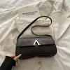 Nova Bolsa Casual Texturizada Simples Quadrada Pequena para Primavera e Verão 2026, Bolsa de Ombro/Axila Feminina Elegante Tendência Nicho