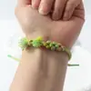 Pulsera Tejida Finamente con Borlas de Flor de Durazno Nueva de Primavera, Tamaño Ajustable para Hombres y Mujeres, Diseño Multicolor de Flor de Durazno, Adecuada para Estudiantes y Zonas Turísticas
